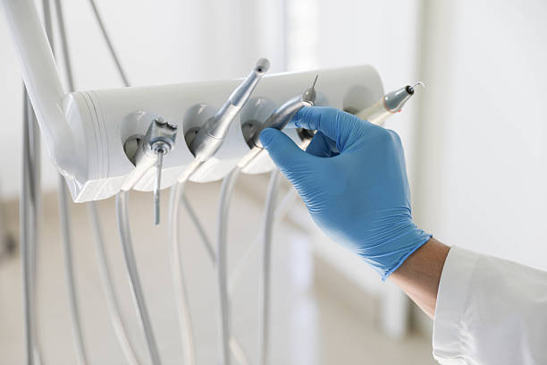 Professional Tooth Extraction technician working in East Falmouth, MA
